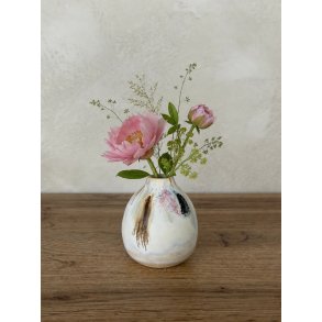 Minivase, Spot